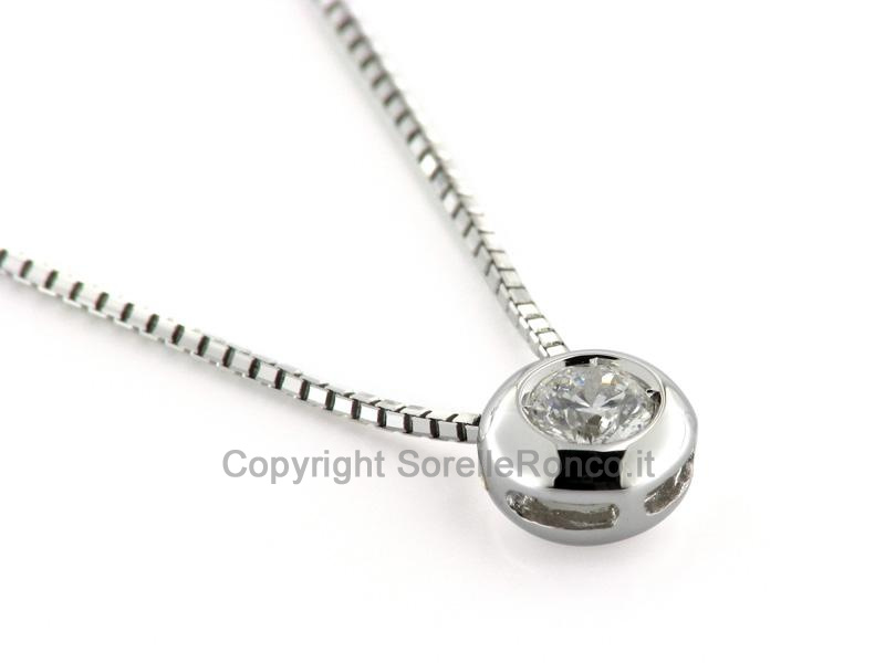 PUNTOLUCE IN ORO CON DIAMANTE CT. 0.21