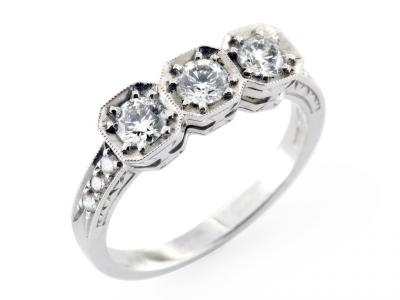 Anello Trilogy in e Oro Diamanti ct.0.65