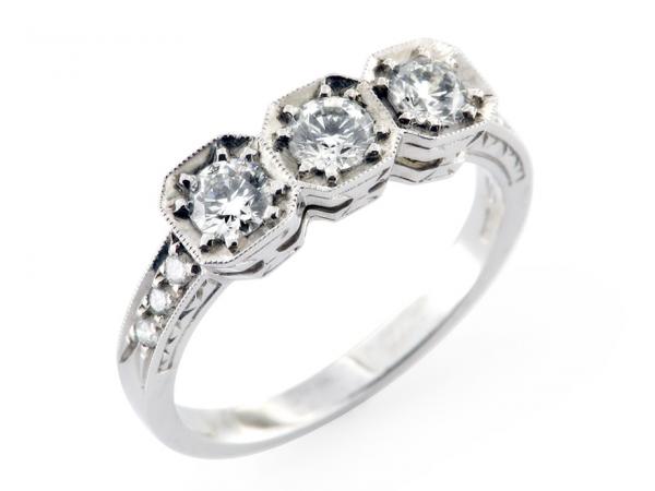 CF00038 - Anello Trilogy in e Oro Diamanti ct.0.65