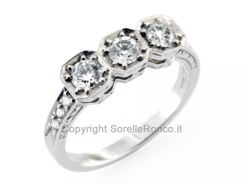 ANELLO TRILOGY IN E ORO DIAMANTI CT.0.65
