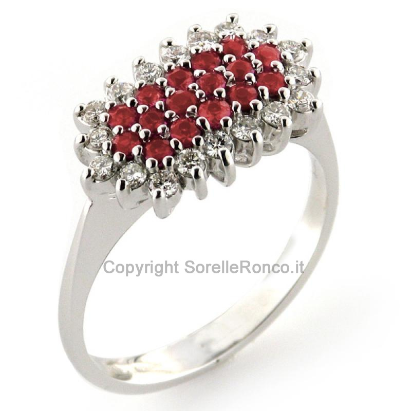 ANELLO IN ORO CON RUBINI A GRIFFE