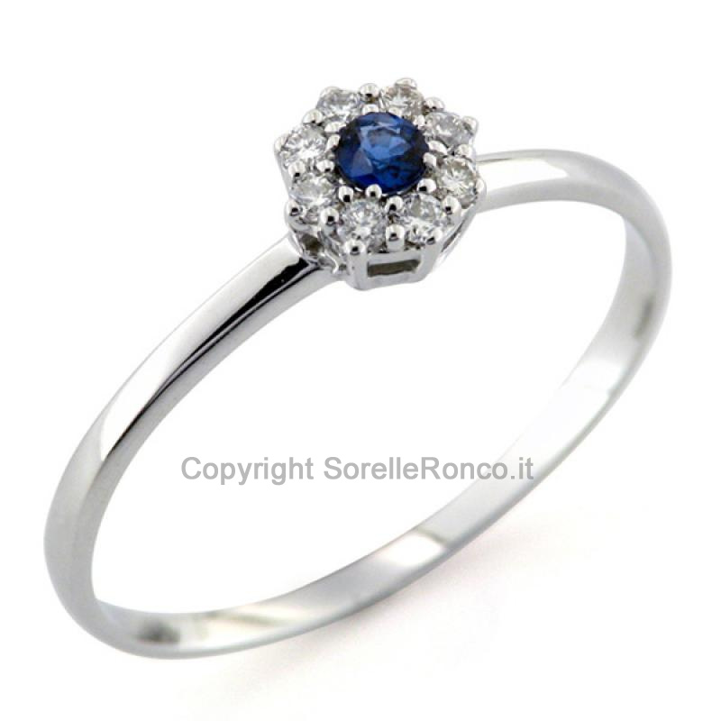 ANELLO ZAFFIRO BLU CENTRALE E DIAMANTI