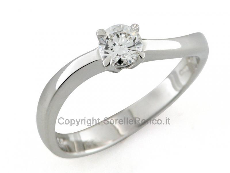 ANELLO SOLITARIO A ONDA ORO BIANCO E DIAMANTE 0.40