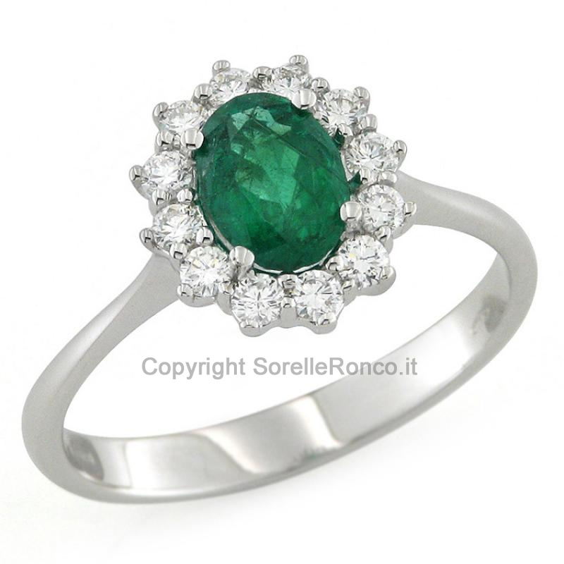ANELLO IN ORO  CON DIAMANTI E SMERALDO 0.70 CT