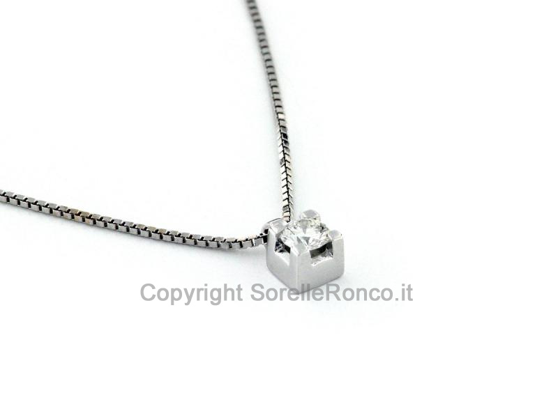 PUNTOLUCE IN ORO CON DIAMANTE 0.12 CT