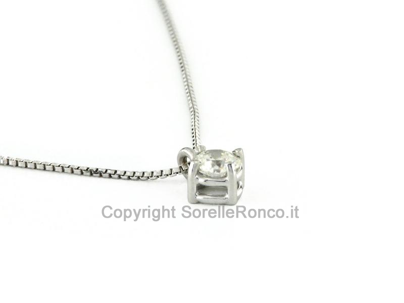 PUNTOLUCE IN ORO CON DIAMANTE 0.22 CT