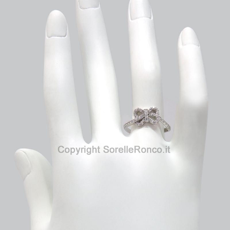 ANELLO A FIOCCO IN ORO BIANCO 18 KT E ZIRCONI 