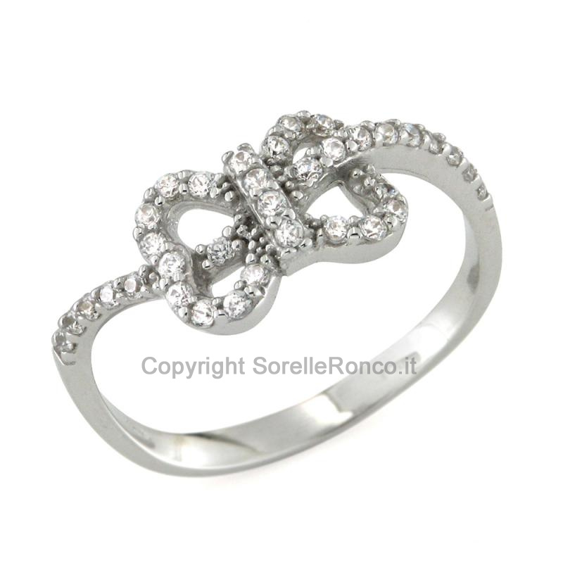 ANELLO A FIOCCO IN ORO BIANCO 18 KT E ZIRCONI 
