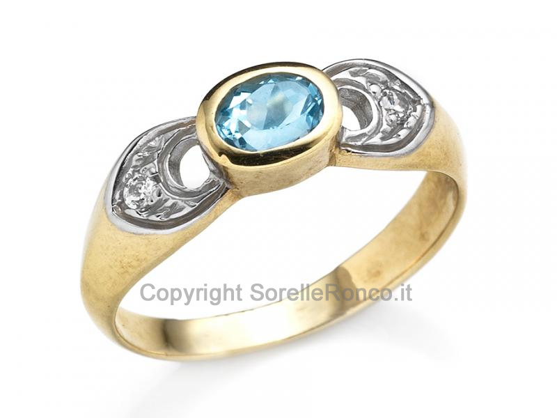 ANELLO IN ORO BICOLOR E ZIRCONE AZZURRO